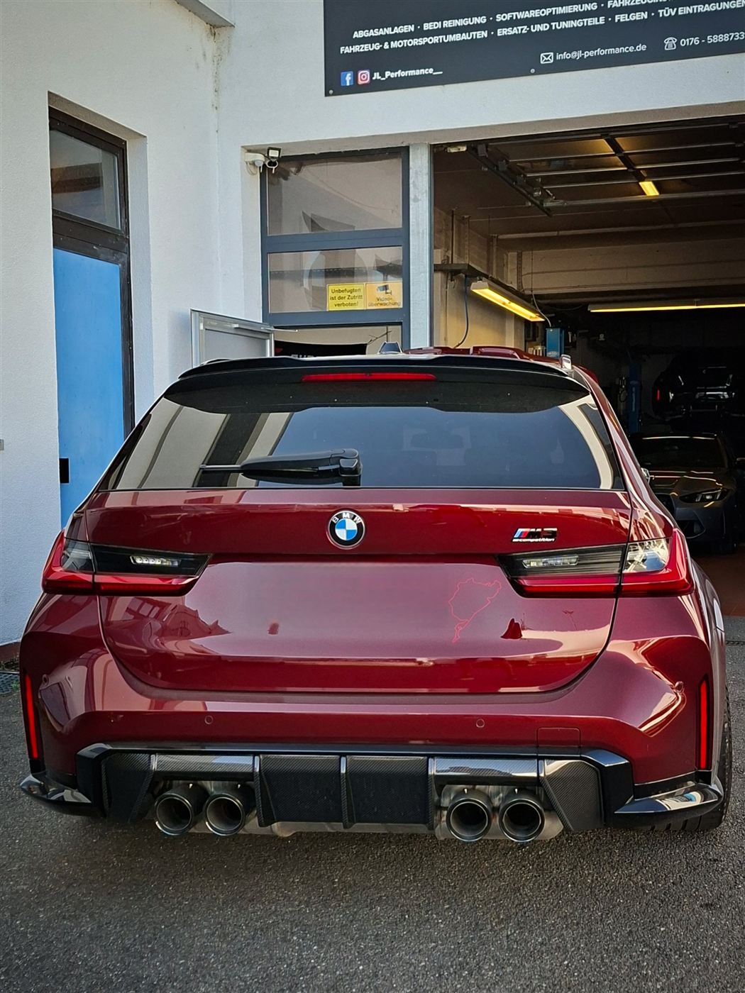 Heck eines BMW M3 Touring mit Endrohren